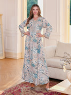 Ms. Apaya's fashionable floral-print long robe dress