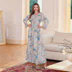 Ms. Apaya's fashionable floral-print long robe dress