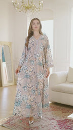 Ms. Apaya's fashionable floral-print long robe dress